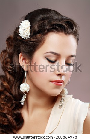 Portrait of Beautiful Woman Wedding Model Over Pink Grey Background. Advertising and Commercial Design. Shopping. Jewelry - Bridal Earrings