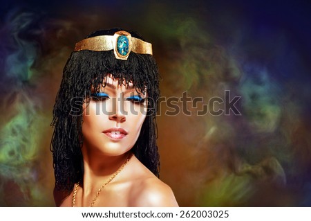 Beautiful egyptian woman bronze portrait over grunge