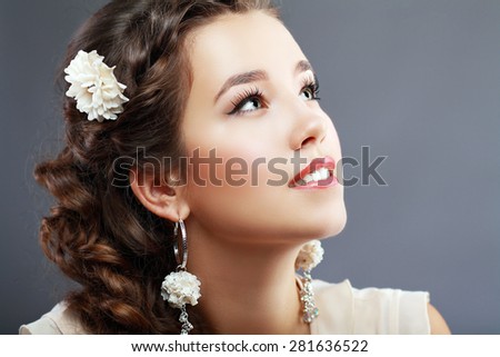 Portrait of Beautiful Woman Hair Wedding Model Over Pink Grey Background. Advertising and Commercial Design. Shopping. Jewelry - Bridal Earrings