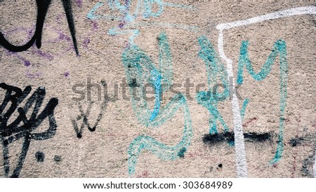 Graffiti wall in urban background of a wall