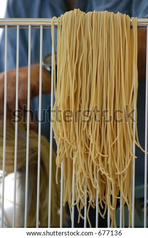 Close up of home made spaghetti on rack at food markets