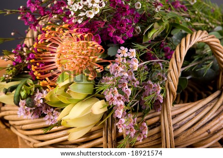 bouquet of australian native flowers in wicker basket