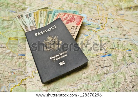 US Passport, Nepal Rupees on a Map of Pokhara Area