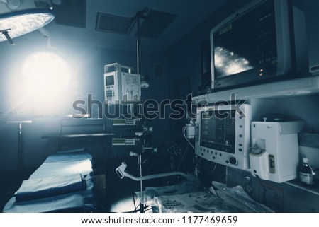 Surgical operating room with equipment for cardiovascular emergency surgery center. Surgery medical clinic with clamps, forceps and injection syringe and surgeons for open heart microsurgery