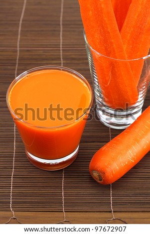 Carrot cut into slices and carrot juice.