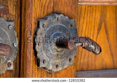 Handle, a very old handle on the door of a church