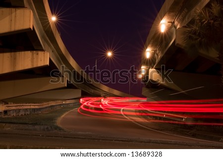 The Ramp, a long exposure of cars going up a ramp after a day\'s work.