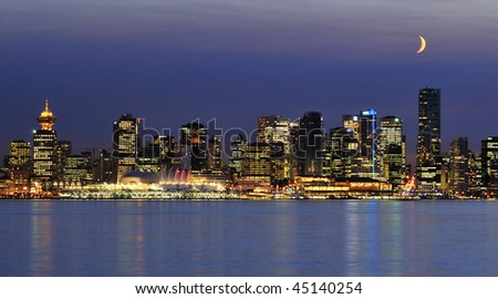 downtown vancouver night scene with crescent moon