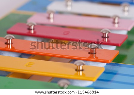 A colorful child xylophone . Picture with short deep focus