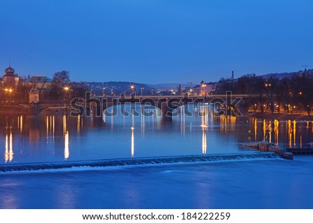 Long time exposure of the skyline in Prague on the river.