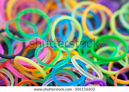 Many rainbow colored  loom rubber rings . Macro Picture