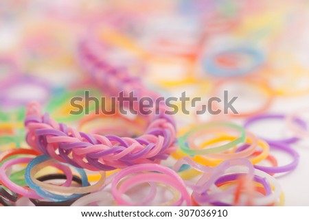Many rainbow colored  loom rubber rings . Macro Picture