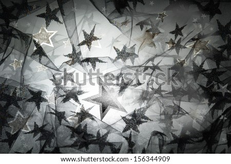 layered stars lace with a back light glow in silver and black