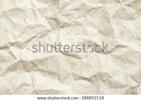 Light brown creased paper background texture