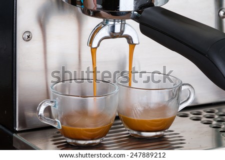 process of making two espresso shots using espresso machine