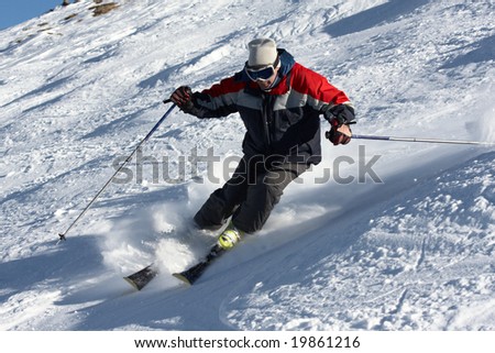 Skier moving down at full speed