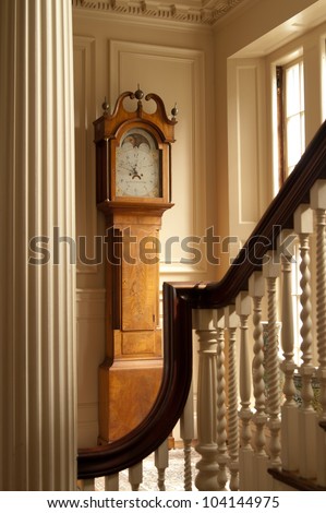 This is a grandfather clock in a historic mansion.
