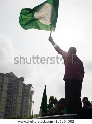 PUTRAJAYA,MALAYSIA-April 20:People show big support to PAS political party candidate during nomination day on April 20,2013 in Putrajaya,Malaysia.The next Malaysian general election on 5 May 2013.