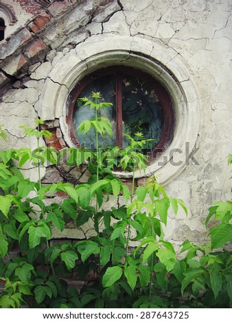 Abandoned building with round window