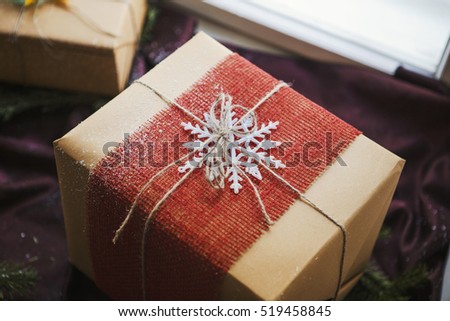 Christmas gift box decorated by snowflake