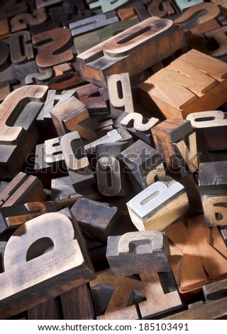 Vintage letterpress printing blocks. Heap of antique printing blocks, different sizes and styles