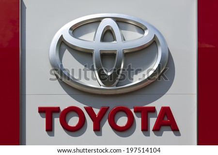 Dusseldorf, Germany - June 12, 2011: Toyota logo at a car retailer\'s building. Toyota Motor Co is world\'s largest automobile manufacturer by sales and production headquartered in Toyota, Japan.
