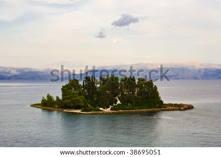 Pontikonisi, Mouse Island, near Corfu, the mountains of Albania in background
