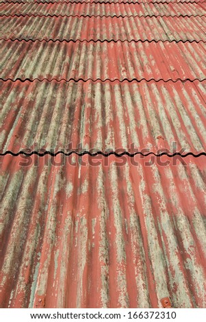 Old red roof tiles , background of old roof