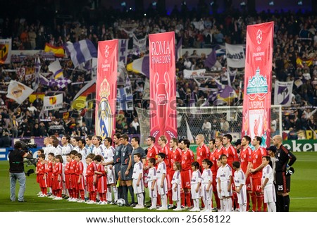 MADRID - FEB 25: Real Madrid and Liverpool players line up before the beginning their Champions League second round match on February 25, 2009 in Madrid.