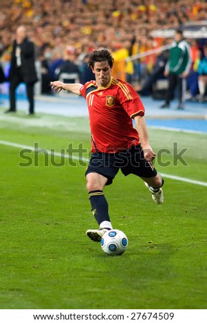MADRID - MAR 28: Spain\'s Juan Capdevila crosses the ball during the second half of their 1-0 victory over Turkey in their World Cup Qualifier March 28, 2009 in Madrid, Spain.