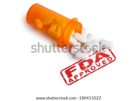 Bottle of Pills and a FDA APPROVED stamp