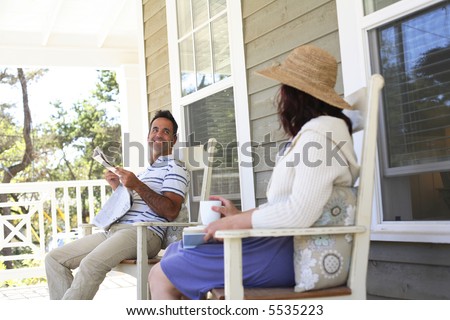 Couple sitting on front porch
