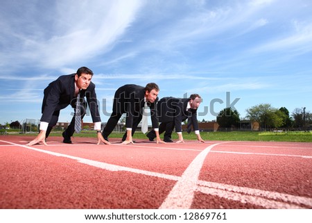 Business people lined up for race
