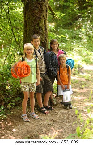 Group of kids with camping gear