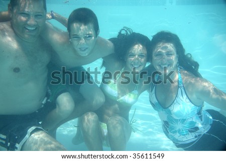 Family of four under water