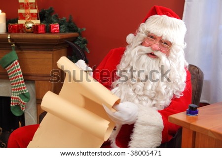 Santa Claus writing names on list