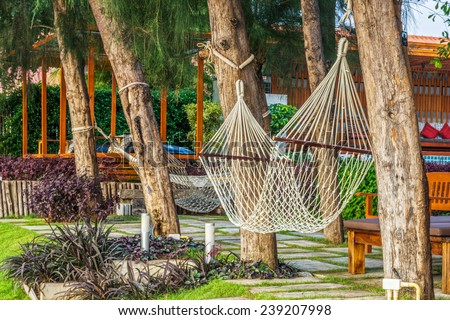 Large white polyester rope hammocks for relaxation