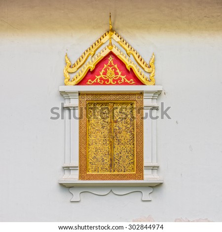 The religion art of wooden window in Thailand Buddhist temple