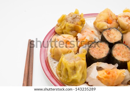Chinese cuisine, steamed shrimp gyoza  and dimsum on white background