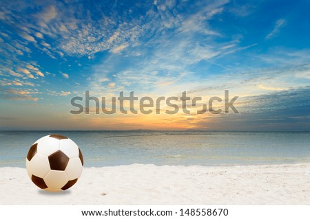 Beach football at dusk