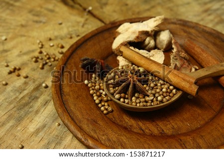 Herbs  aromatic ingredients  natural food additives on grunge wooden board