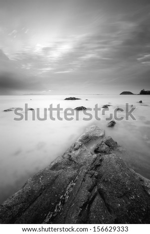 Black and white view of rock and seascape,Samui island,Thailand...Long exposure