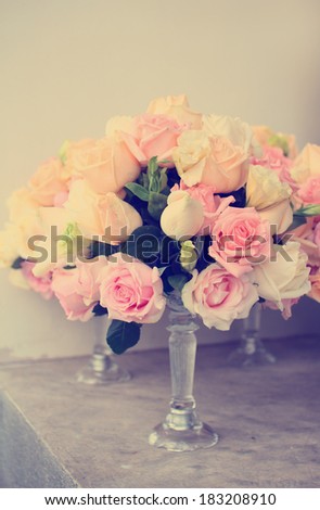 Rose flower arrangement for wedding table,vintage filter effect