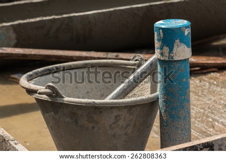 Blue plastic tube on concrete pouring area