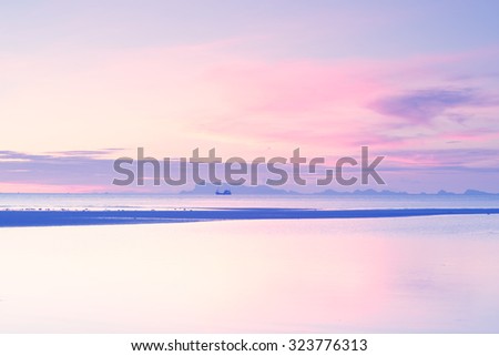 Vintage beach and sky at dusk background