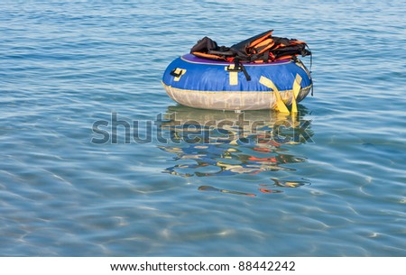 Group of life jackets on life buoy