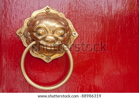 Red chinese door with a lion-sing-ha head. Chinese New Year celeb