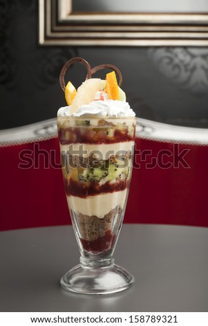fruit cup with chocolate and whipped cream