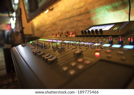 Detail of a music mixer in bar