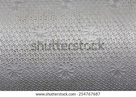 engraved silver metal texture close up
